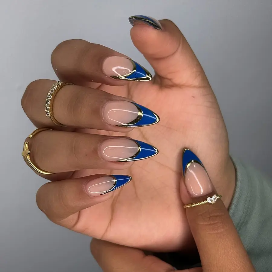 Deep Blue V-French Tips With a Sleek Gold Outline