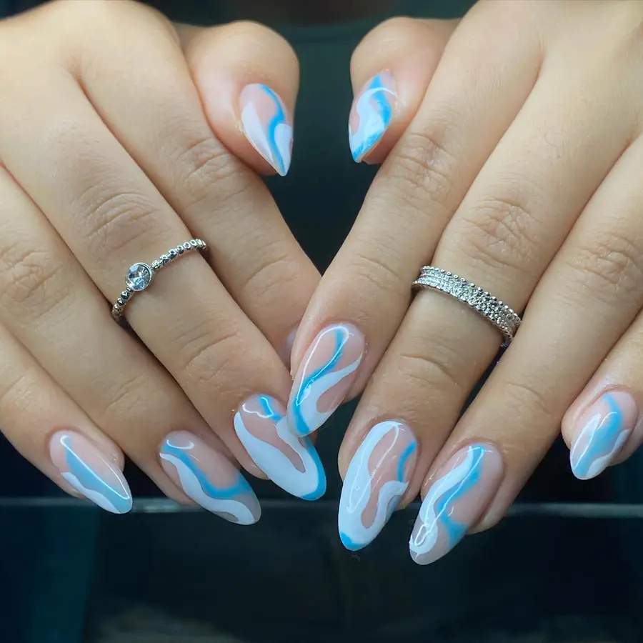 Flowing Blue and White Marble Swirl Nails