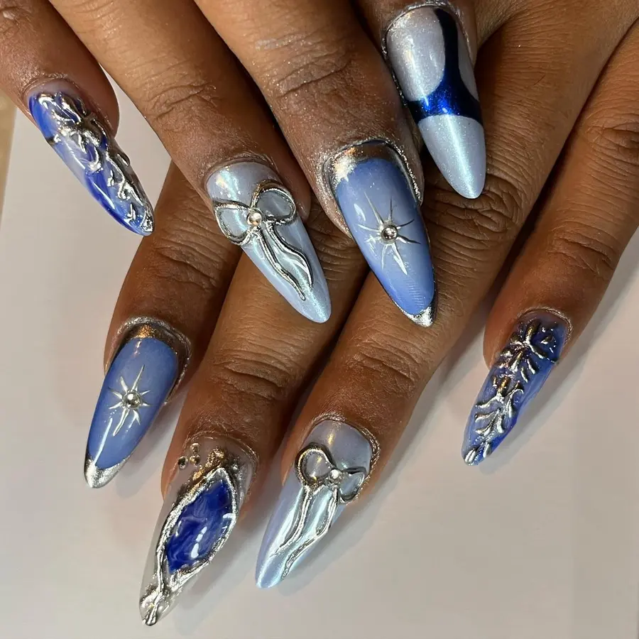 Icy Blue and Silver Chrome Nails With Sculpted Metallic Details