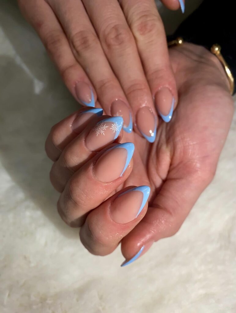 Sky Blue French Tips with a Soft Nude Base