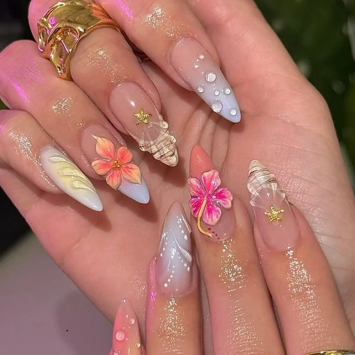 3D shells, starfish charms, and floral accents
