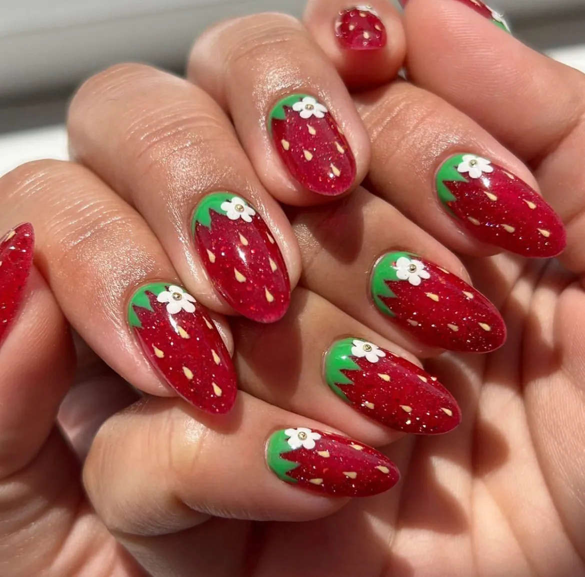 Red Glitter Strawberry-Inspired Nails with White Flowers