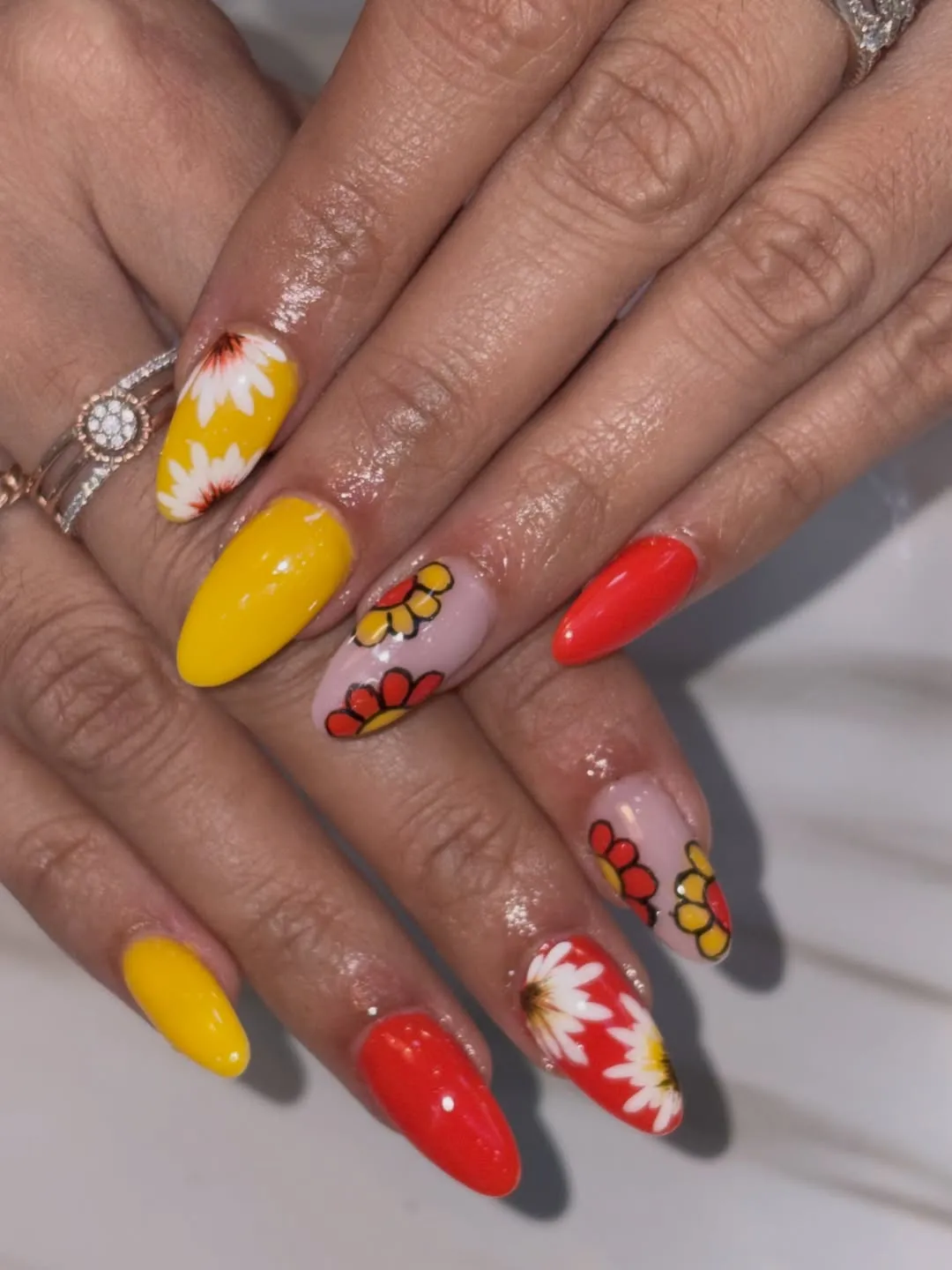 Bright Yellow and Red Florals on Almond Nails