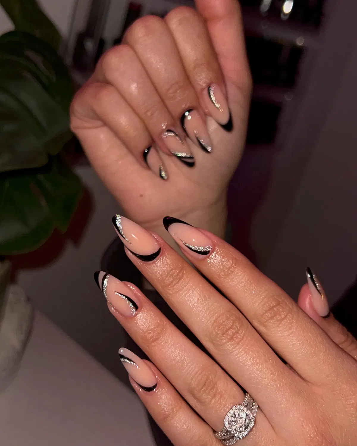 Curved black French lines with silver-glitter accents