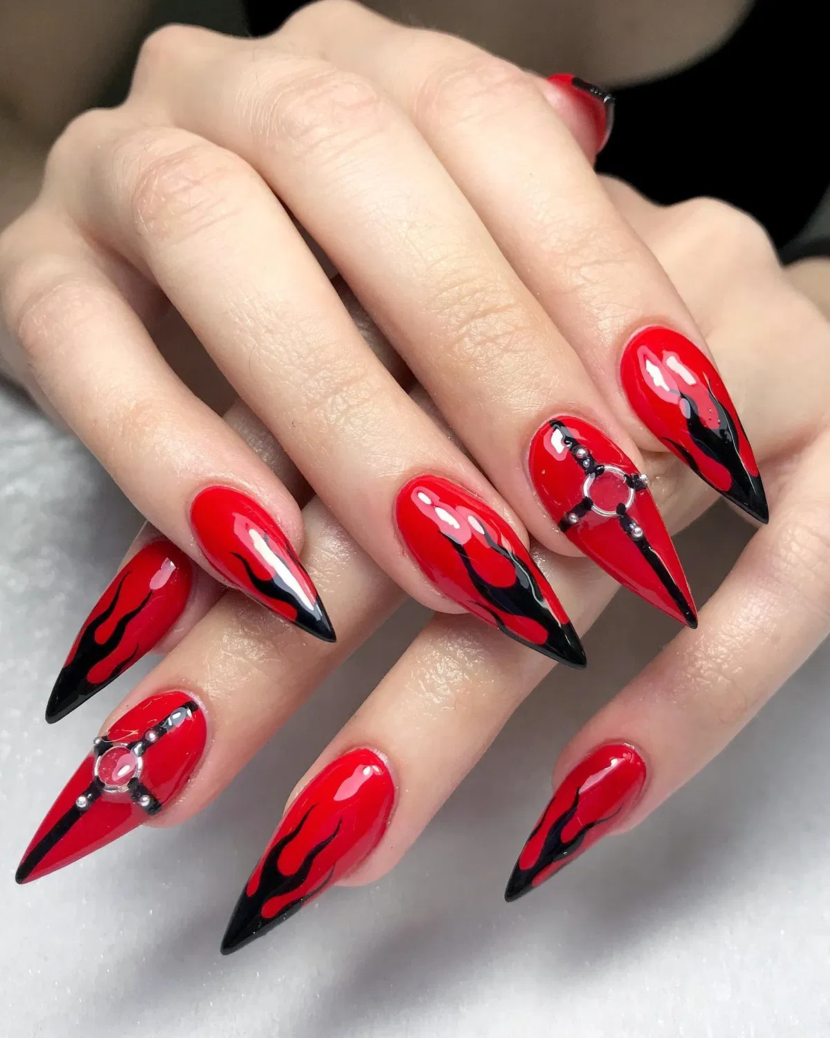 Red stiletto flames with silver ring accents