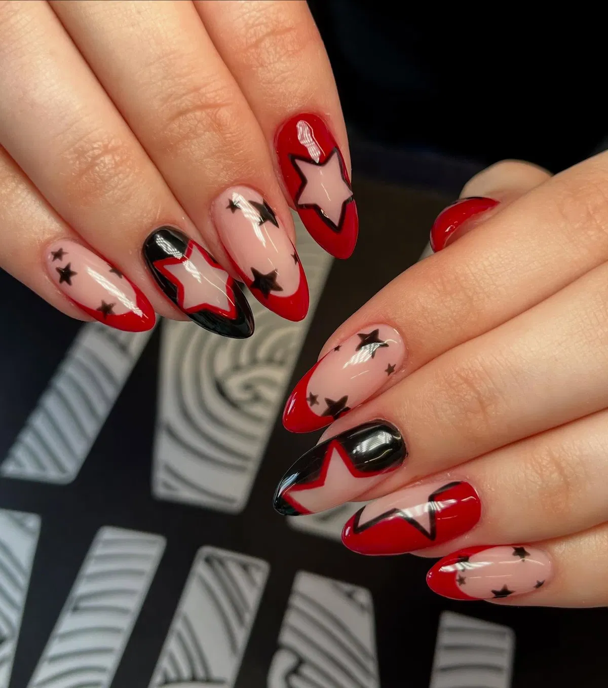 Red, black, and nude star accents