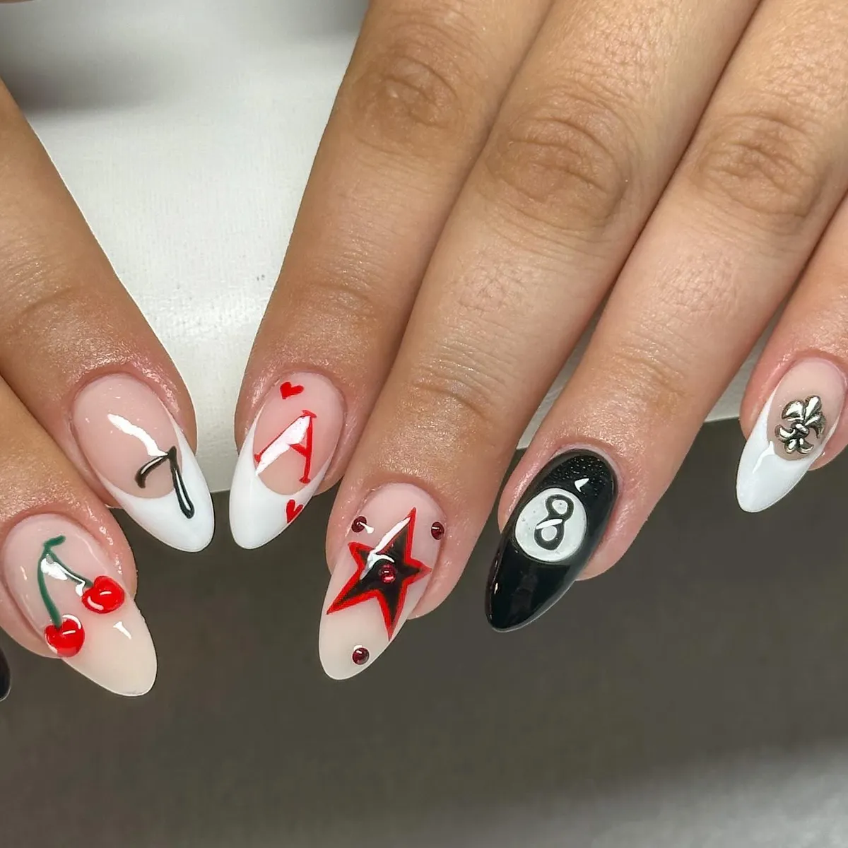 White tips with red-and-black graphic icons