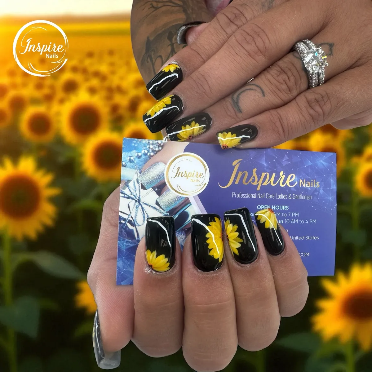 Glossy black nails with partial sunflower petal placements