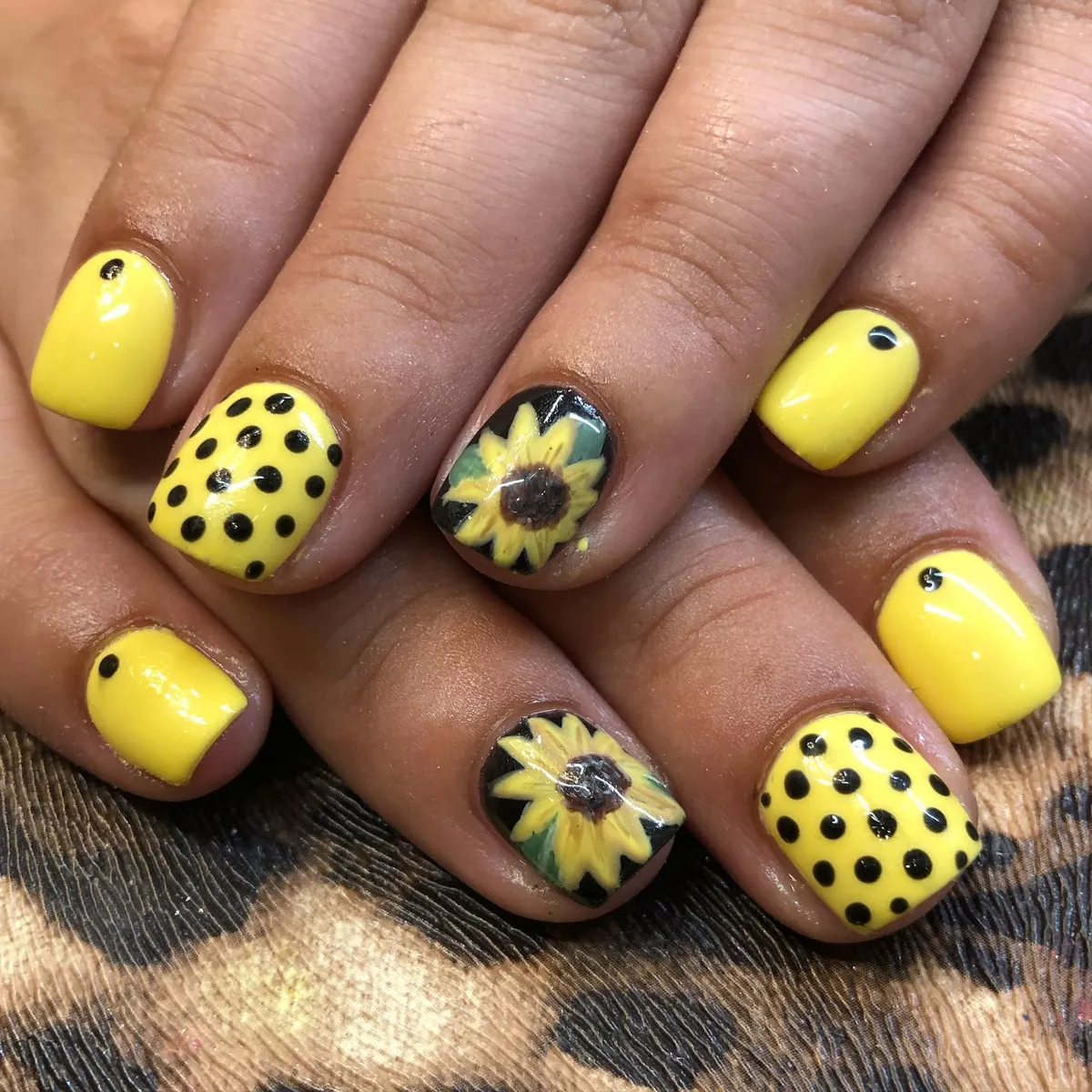 Short yellow set with polka dots and black floral accents