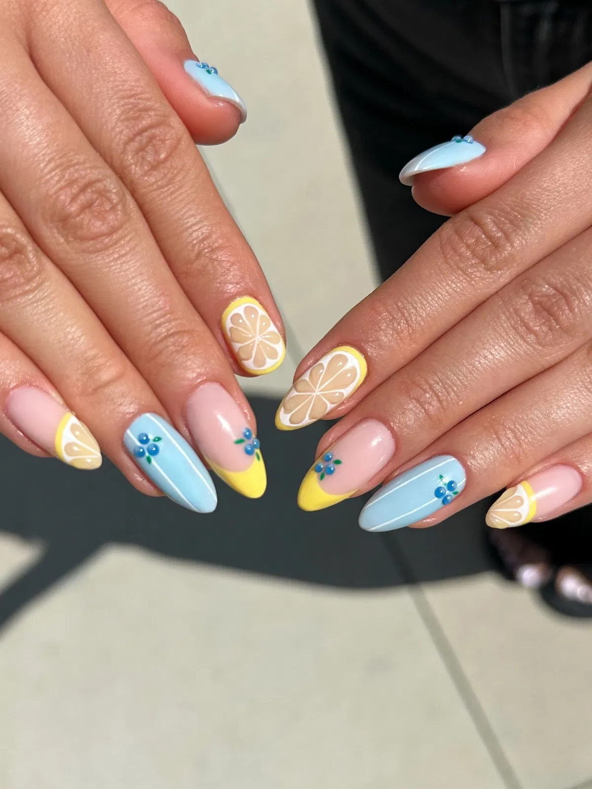 Pastel blue and yellow French tips with lemon slices