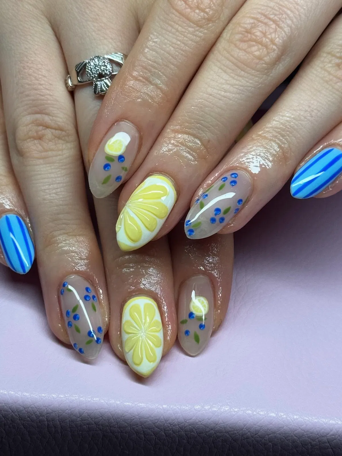 Glossy lemon slices with blue berry dots