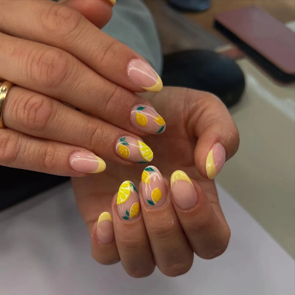 Yellow French tips with fruit accents