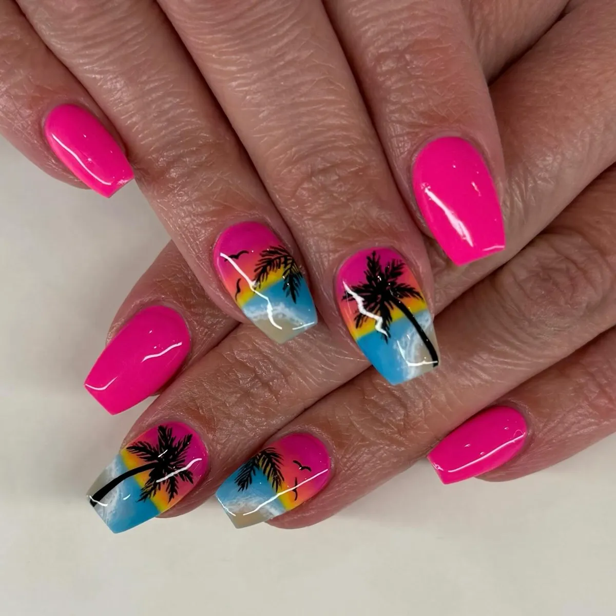 Hot pink base with gradient palm silhouettes