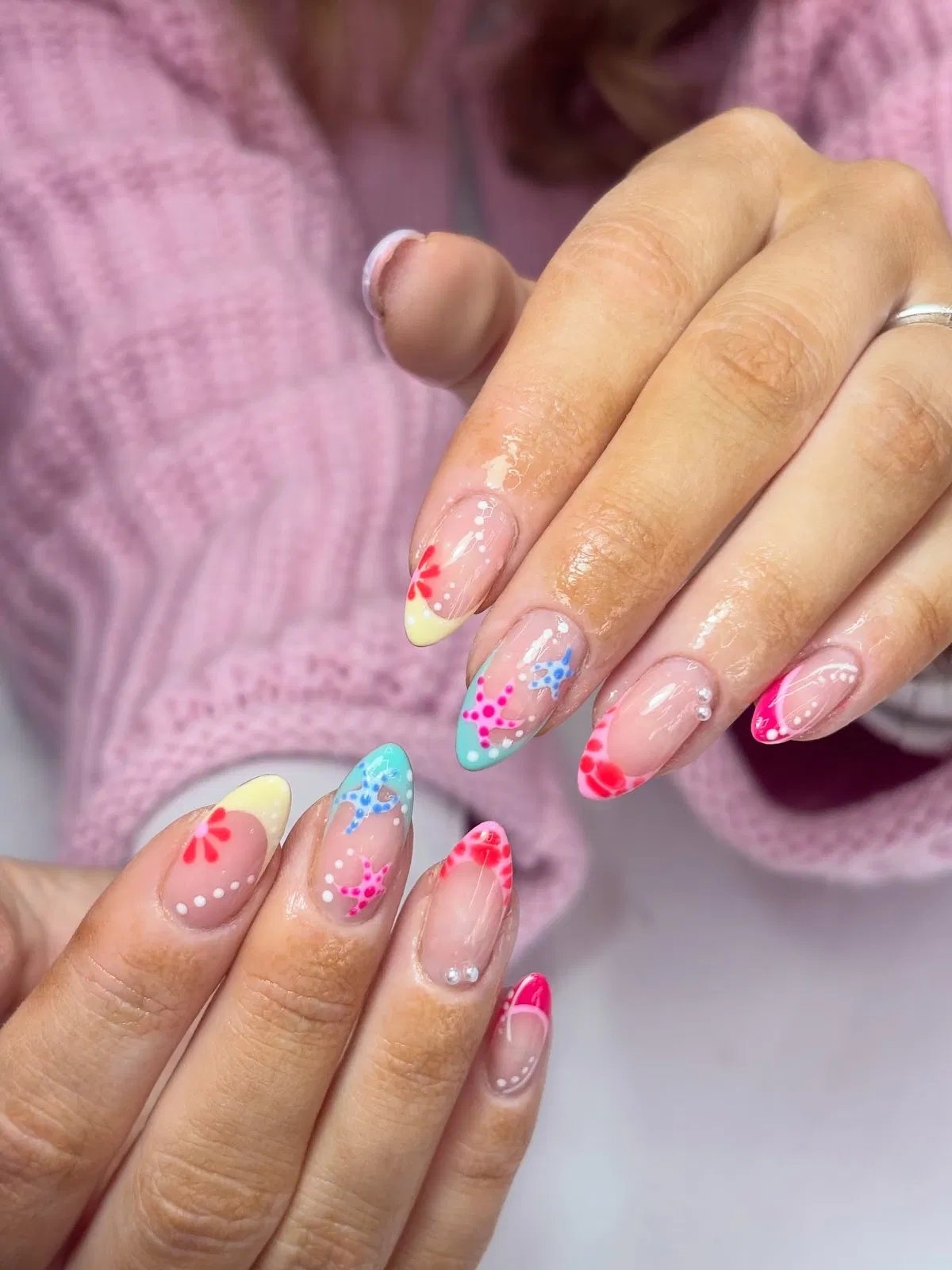 Translucent base with colorful tips, dots, and starfish shapes