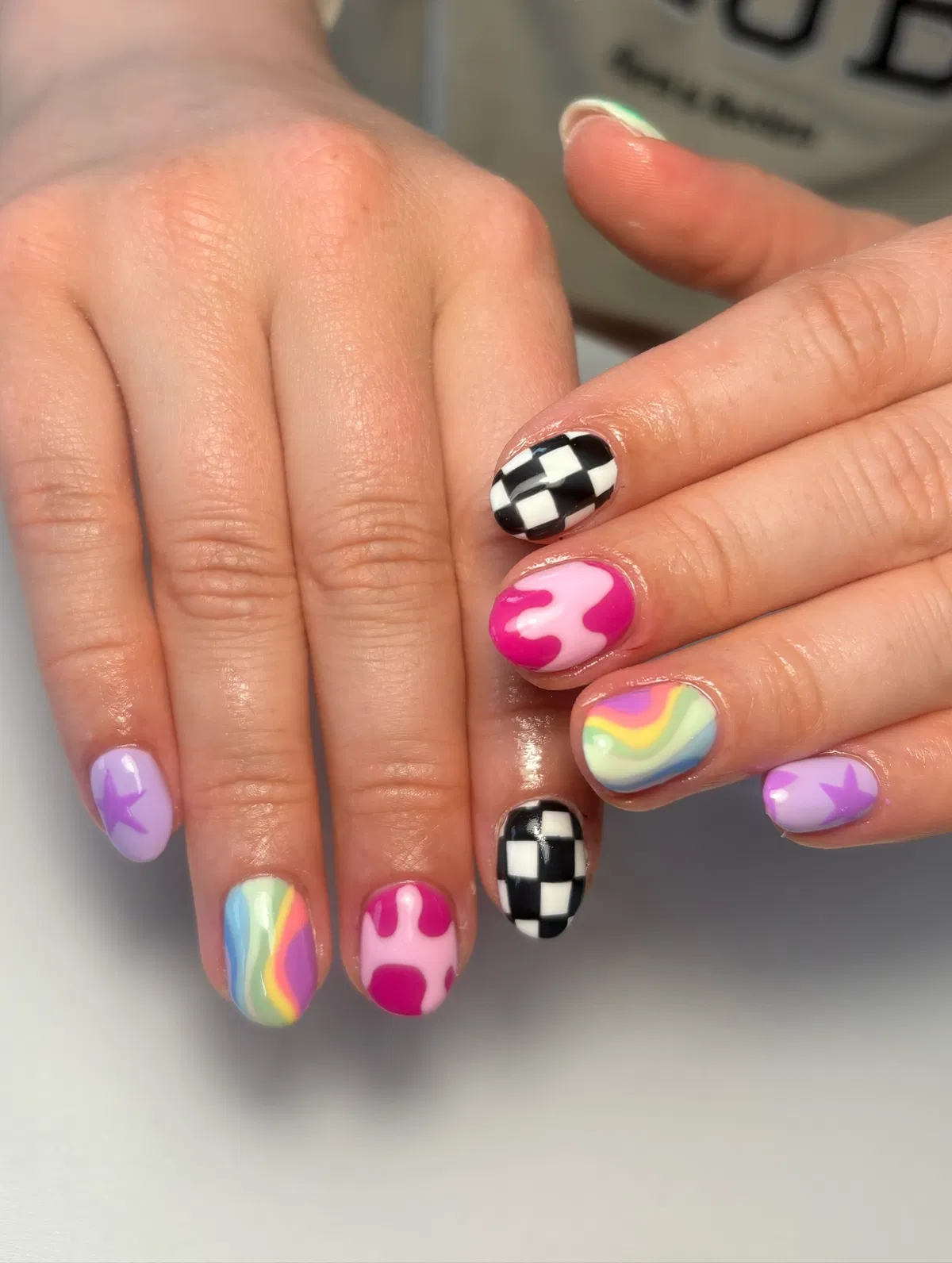 Checkerboard, Rainbow Swirls, and Pink Blob Patterns