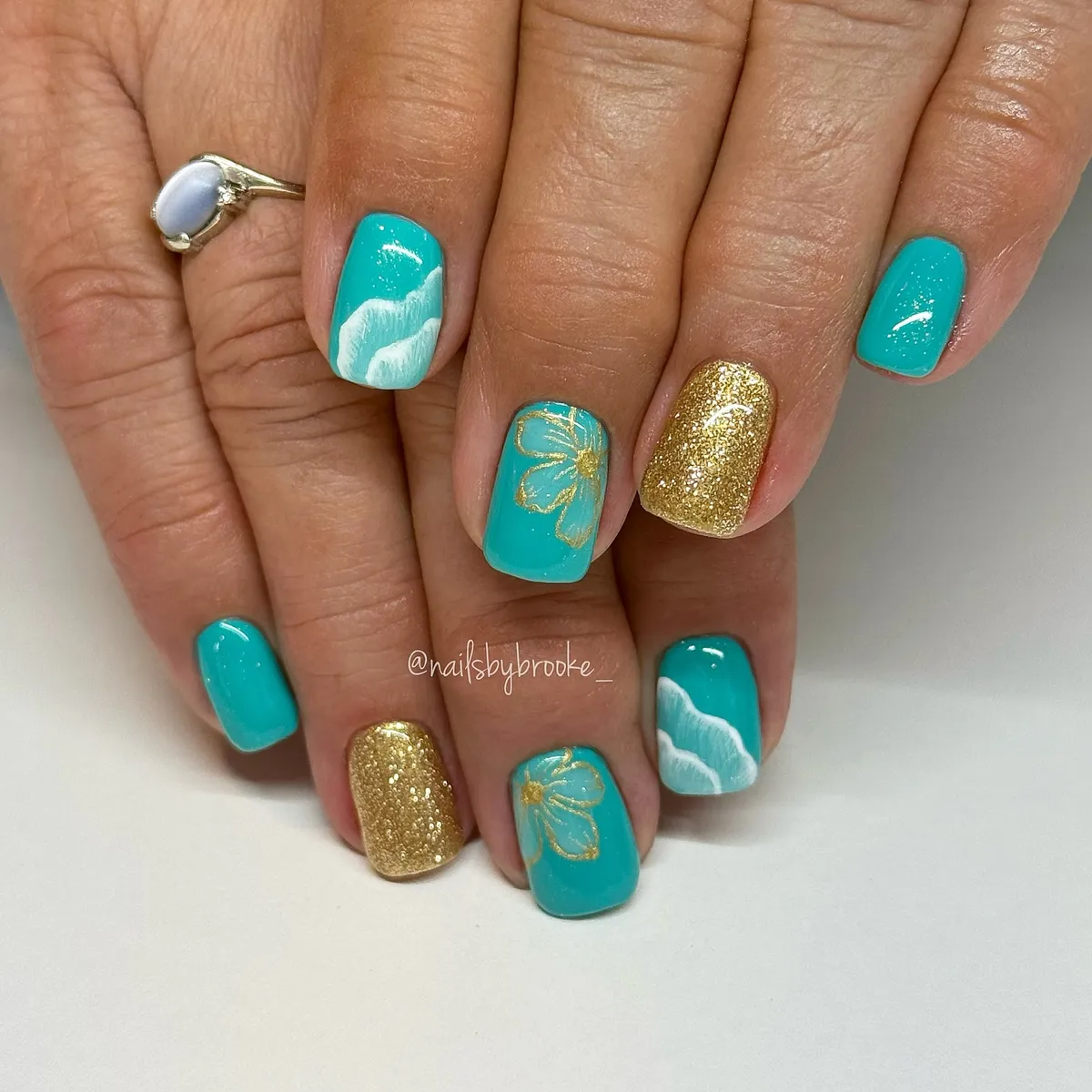 Teal, Gold Glitter, and Wave/Flower Accents