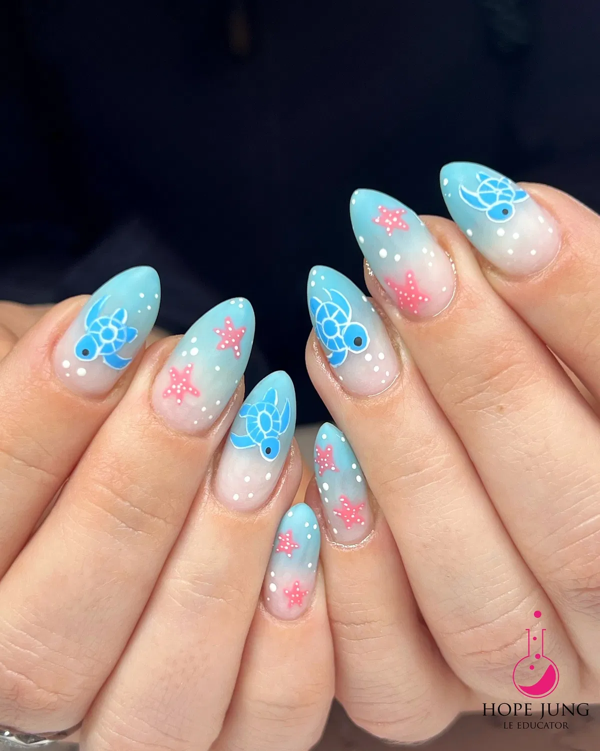 Aqua gradient with turtles, starfish, and white dots