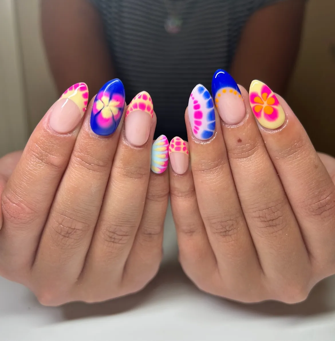 Bold blue and neon pink with flower and dot accents