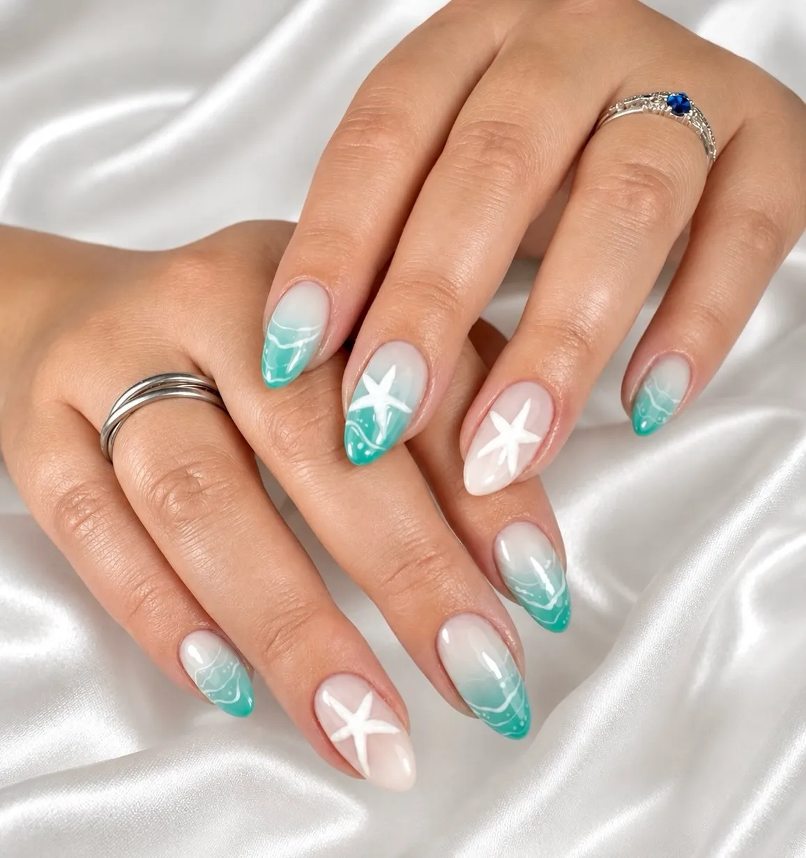 Teal wave tips with white starfish accents