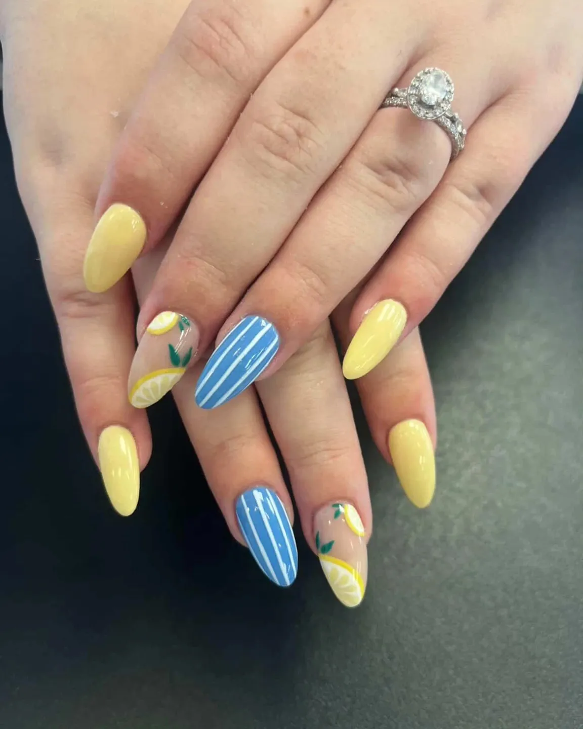 Pale yellow with blue-and-white stripes and lemon accents