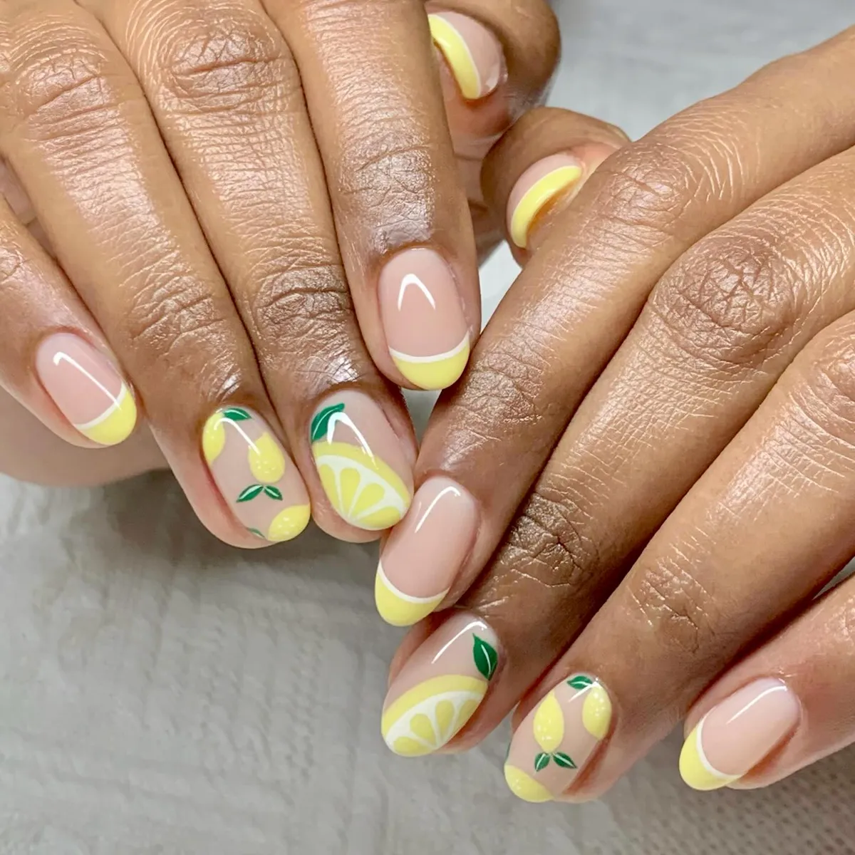 Pale yellow tips with small fruit and leaf accents