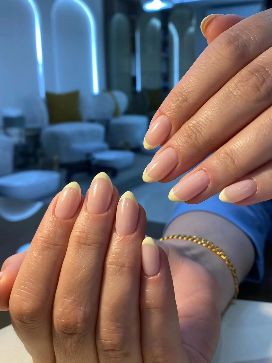 Minimal pale-yellow French tips