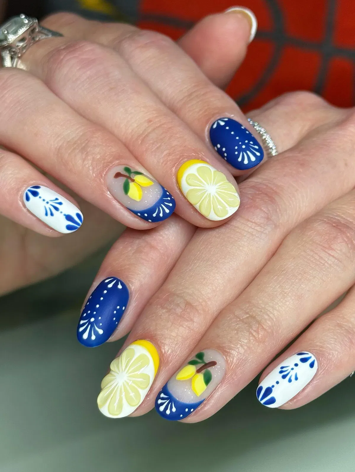 Navy-and-white patterns with pale yellow citrus slices