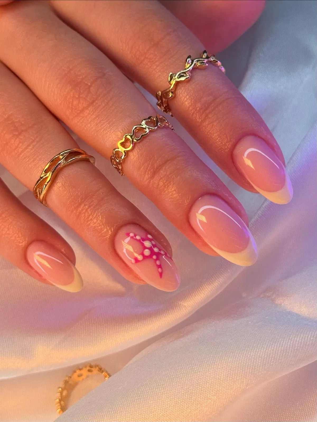 Pink-to-yellow fade with dotted line accent