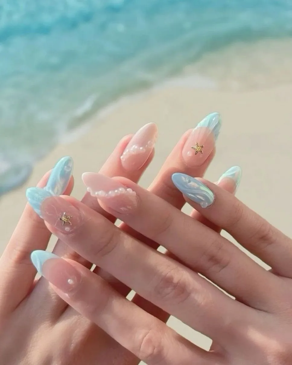 Nude-pink set with blue tips, pearls, and starfish charms