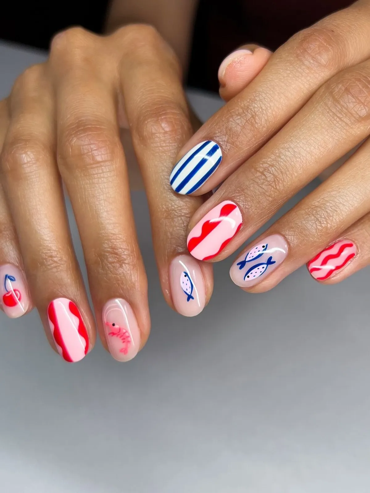 Blue stripes, red waves, and fish motifs