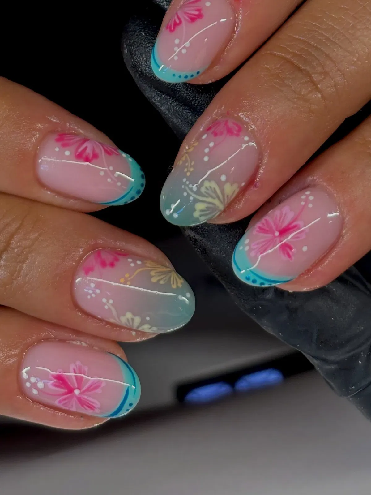 Close-up: turquoise tips with pink and cream florals