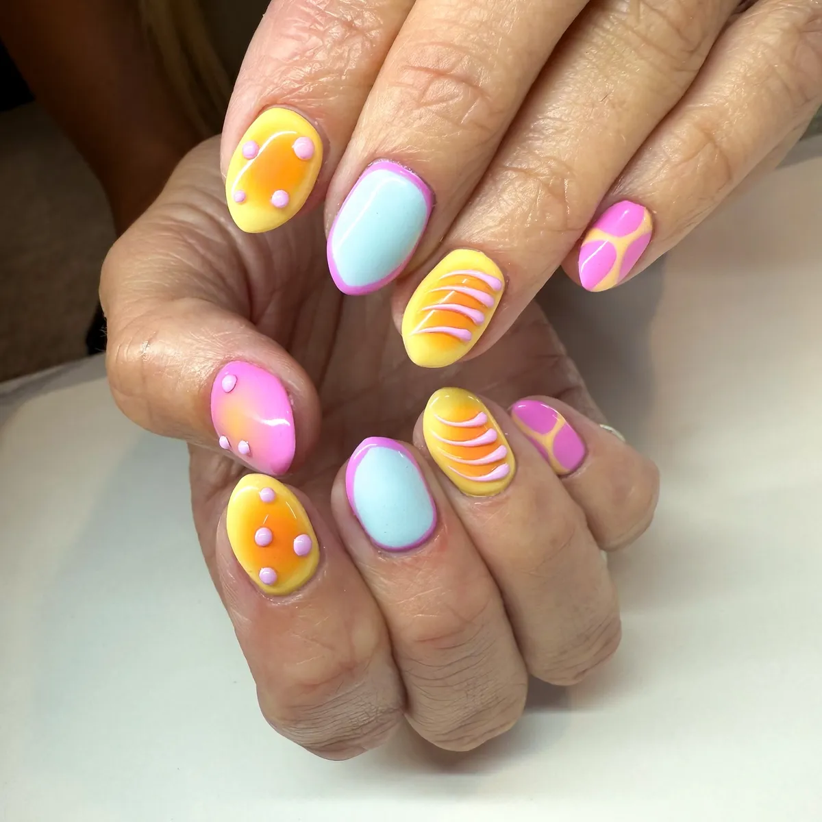 Bright pastel set with raised dots and curved ridges