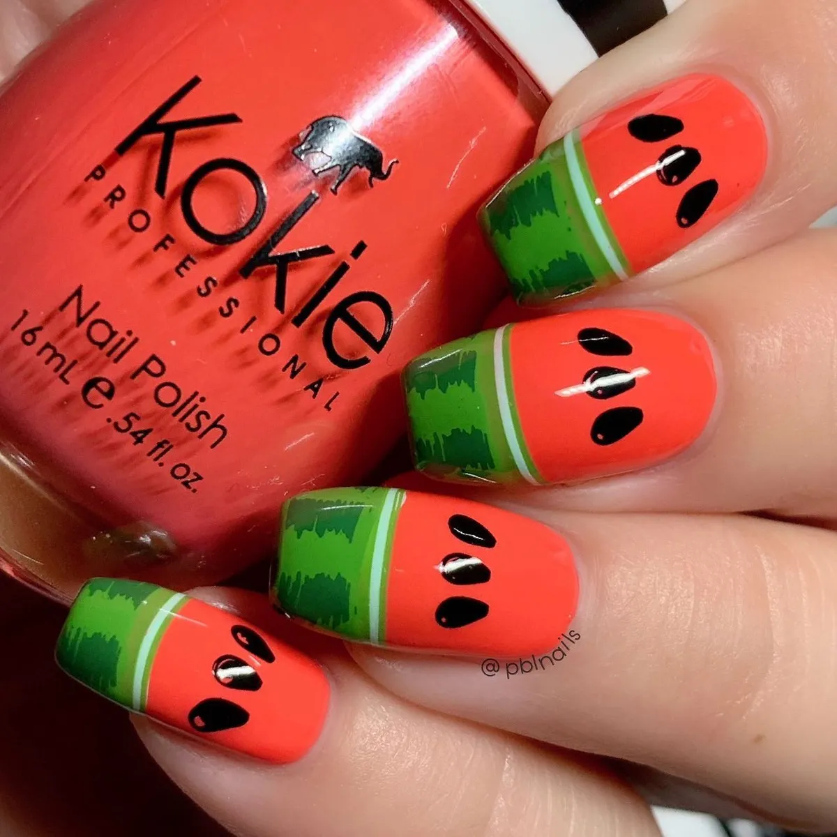 Red-orange and green color-block with black ovals