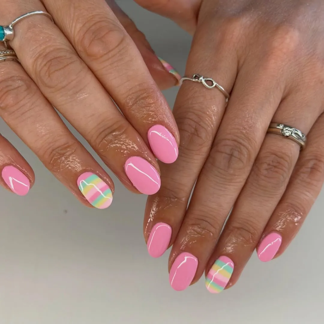 Light pink set with pastel stripe accent nails
