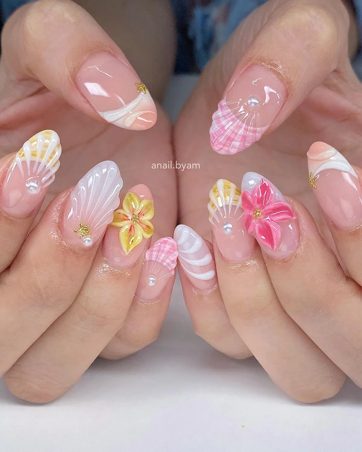 3D shell textures with pearl beads and flower embellishments
