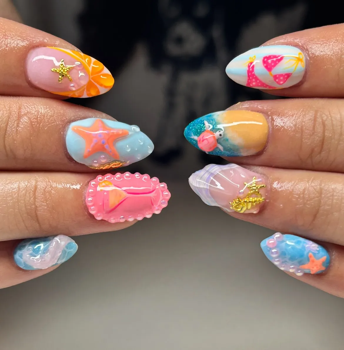 3D beach icons: starfish, bikini graphic, and raised drink frame
