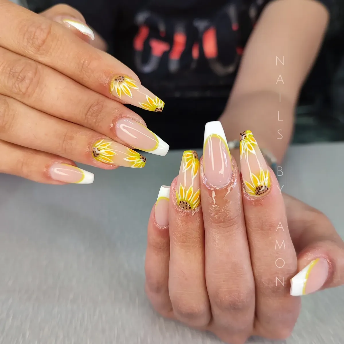 French tips with sunflower petal corner art