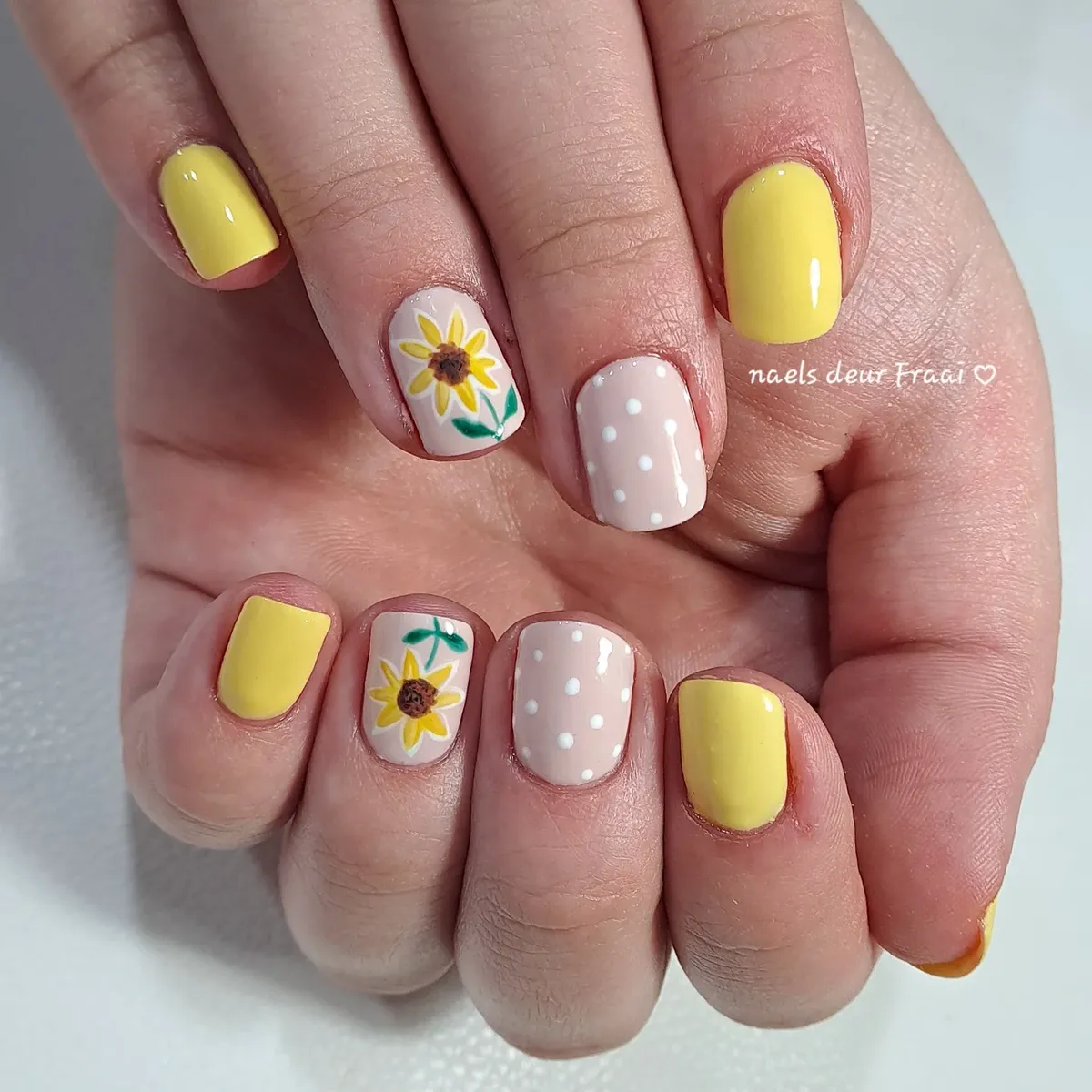 Short pale-yellow set with sunflower and polka-dot accents