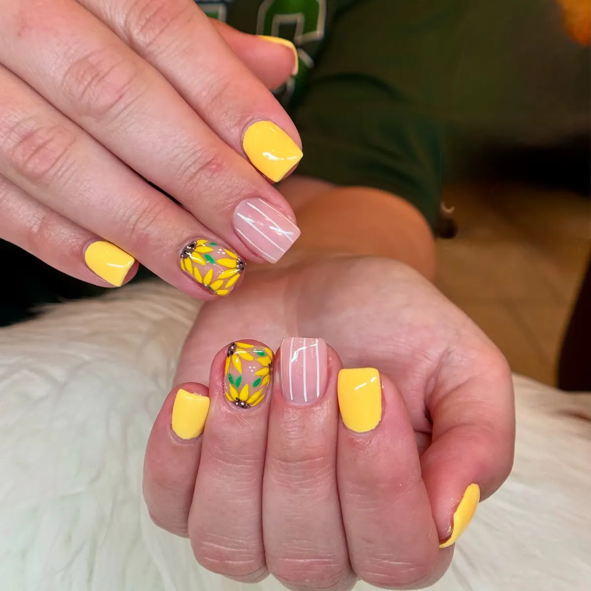 Yellow solids with striped nude and sunflower-frame accents