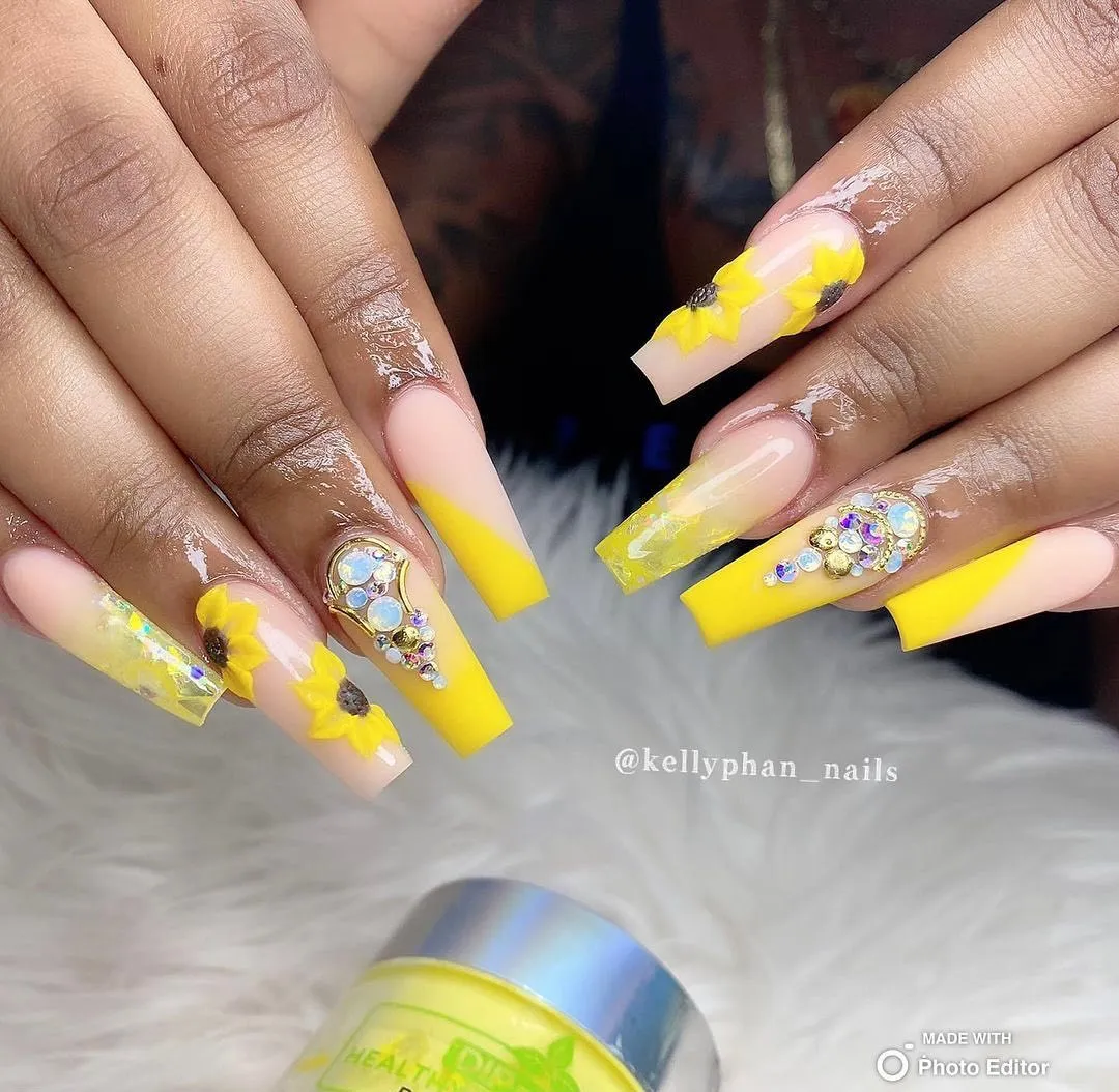 Yellow ombrΓ© coffin nails with 3D sunflowers and rhinestone clusters