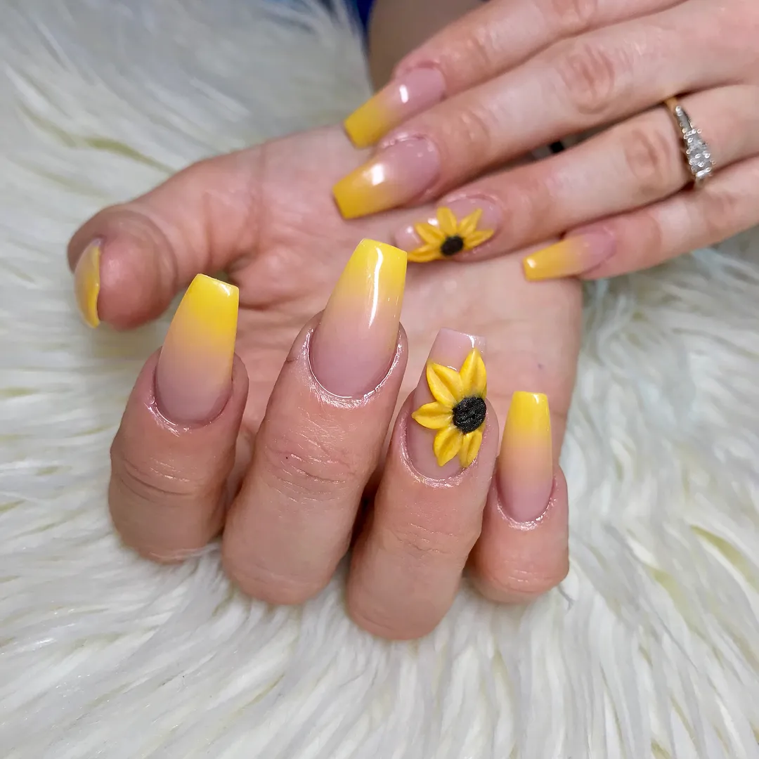 Yellow ombré tips with raised flower accents