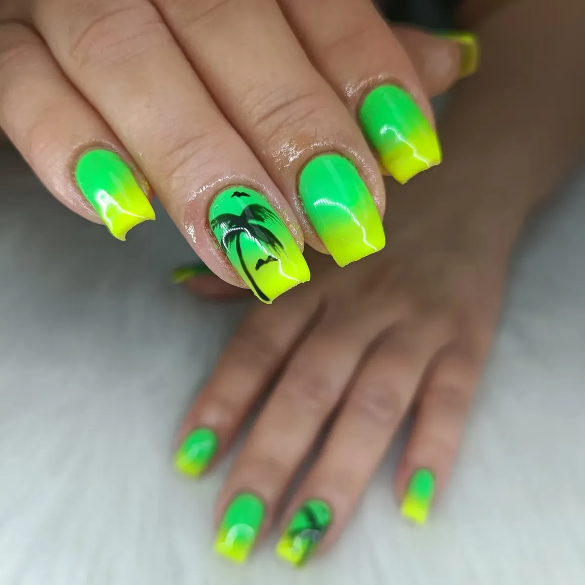 Green-to-yellow ombré with black palm silhouette