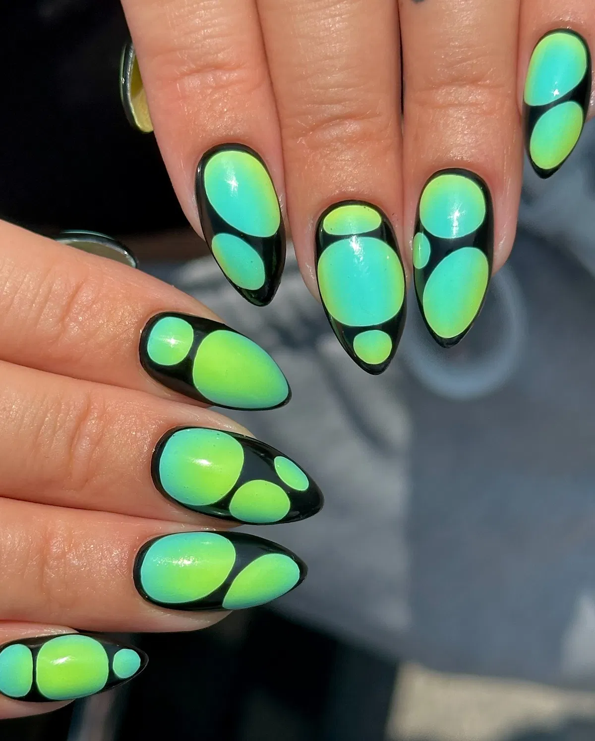 Black base with neon green gradient bubble shapes