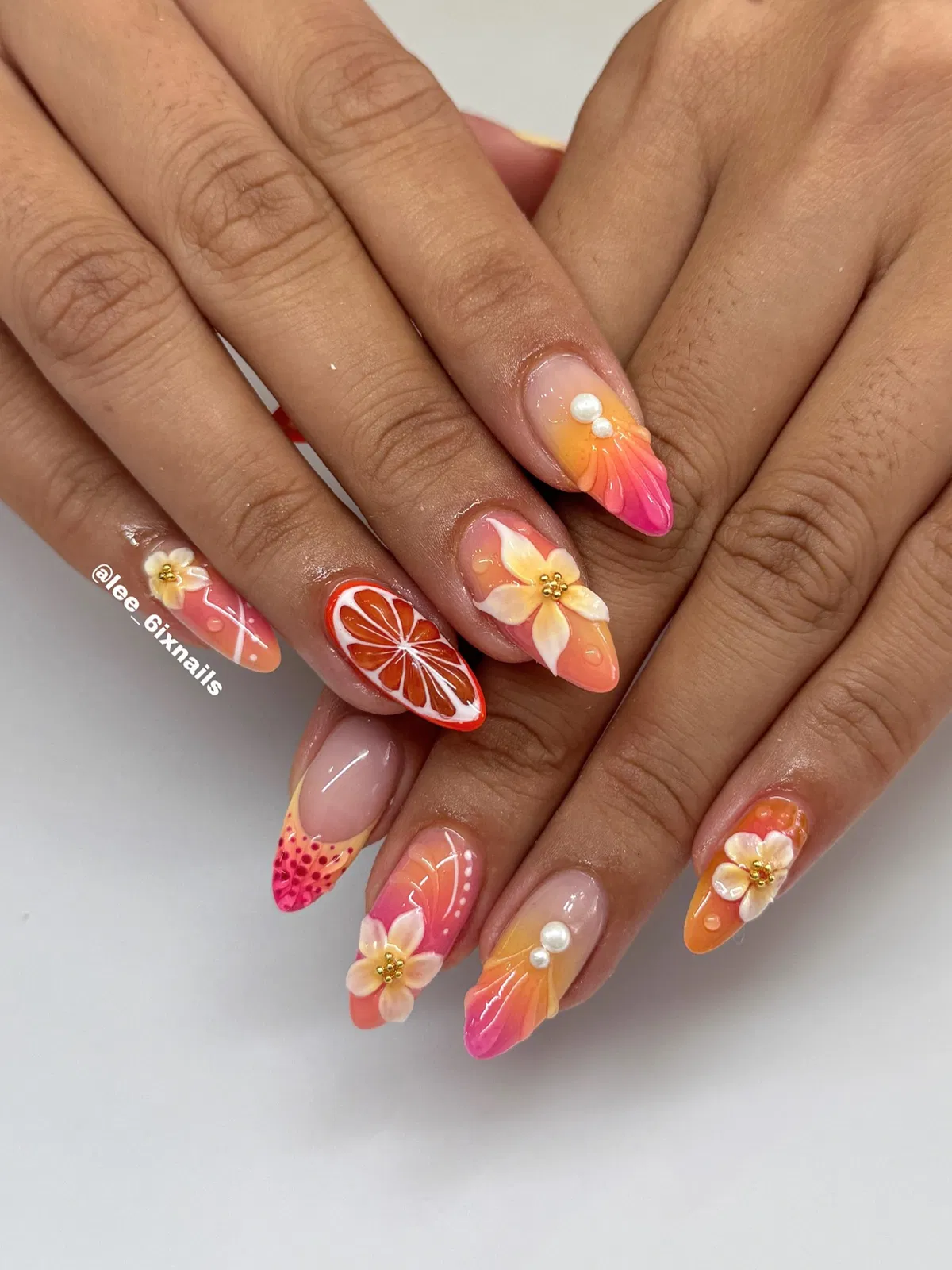 3D citrus-and-flower set with orange slice accent