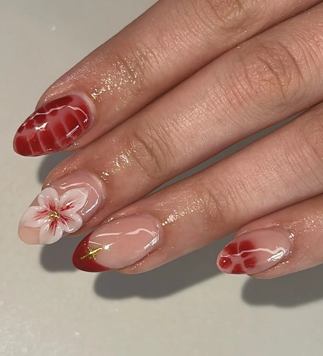 Red marbled accents with 3D white flower detail