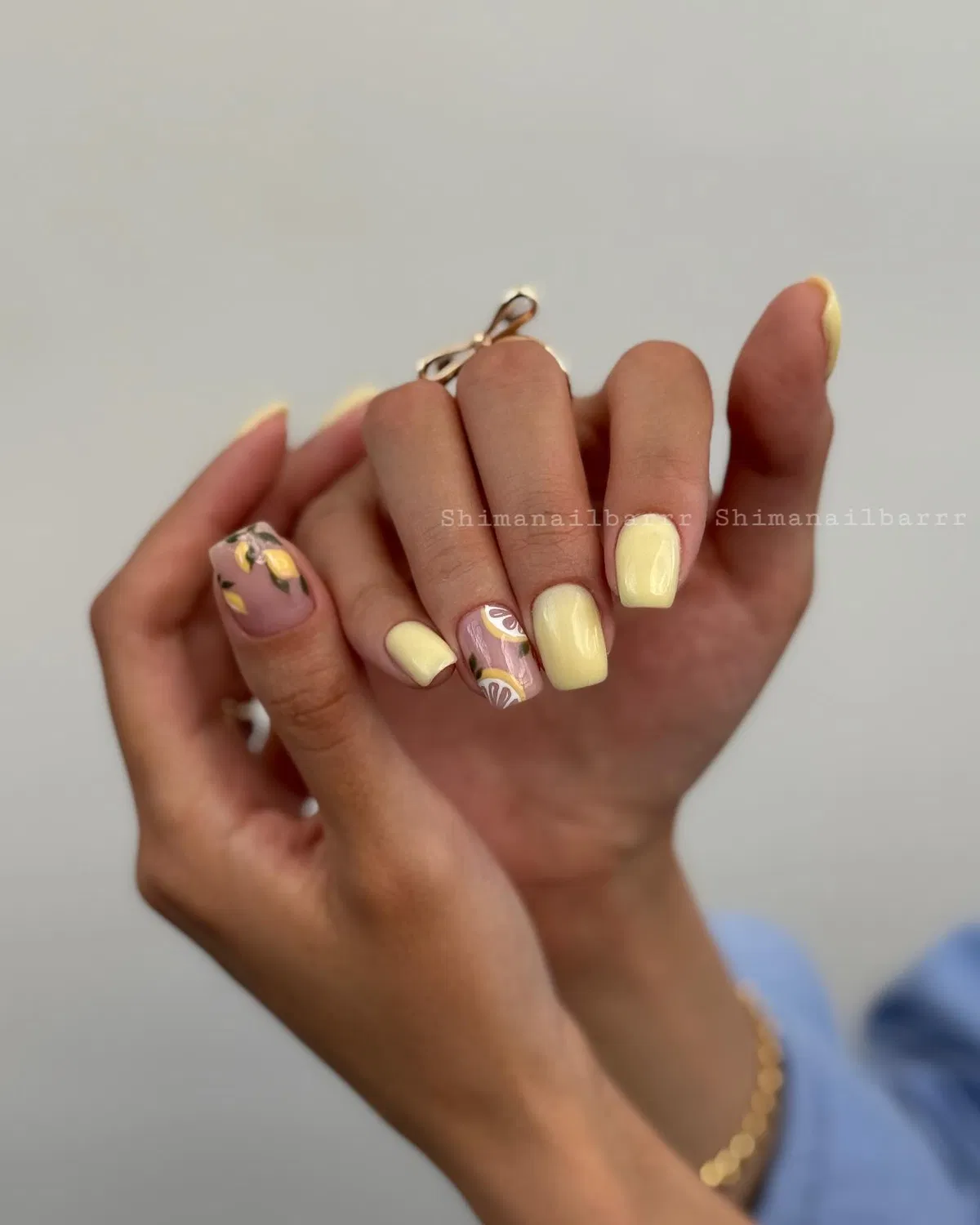 Buttery yellow set with mauve lemon-slice accent nails