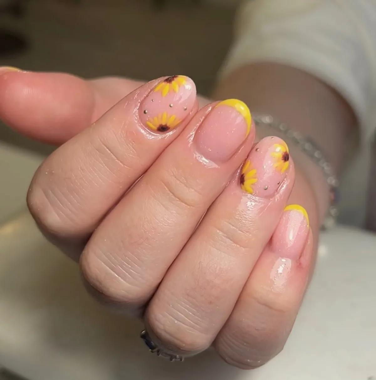 Mini sunflowers with yellow French tips
