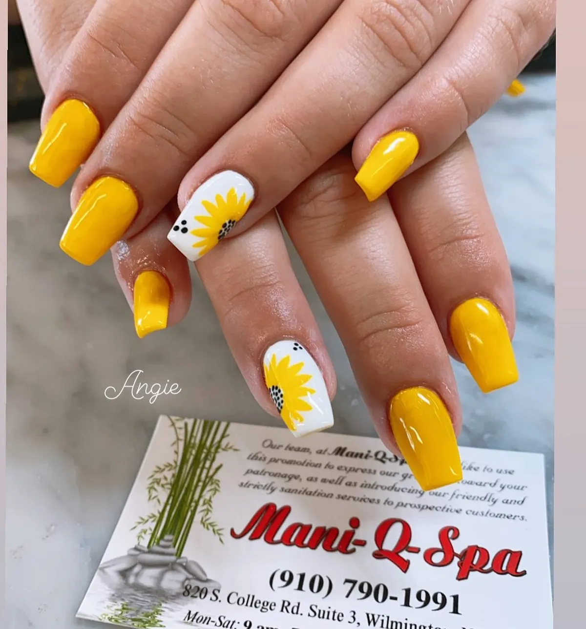Bright yellow set with white sunflower accent nails