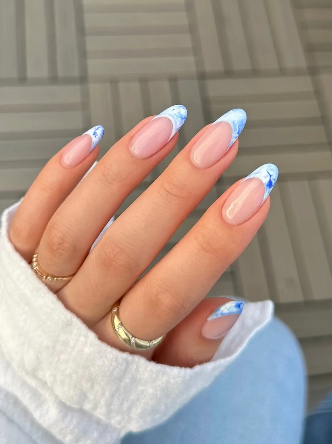 Blue-and-white marbled French tips