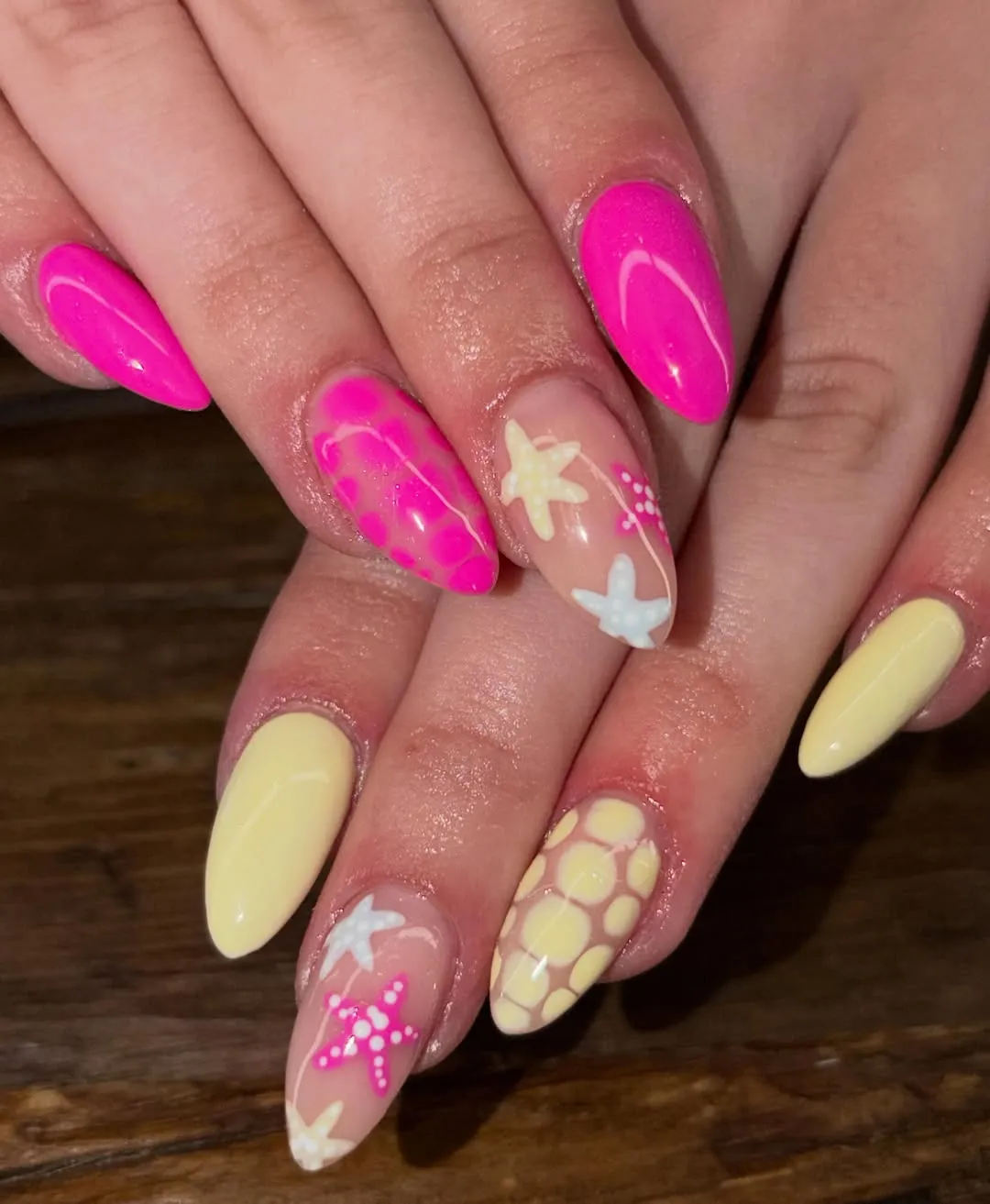 Hot pink and pale yellow with starfish accents